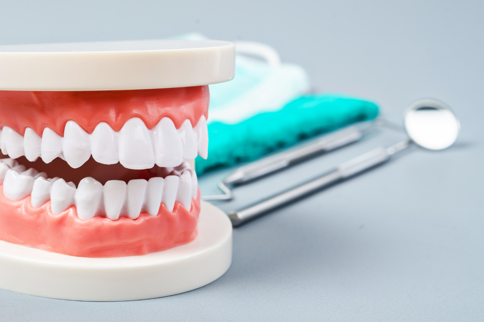 Before and after comparison of a person's smile. The